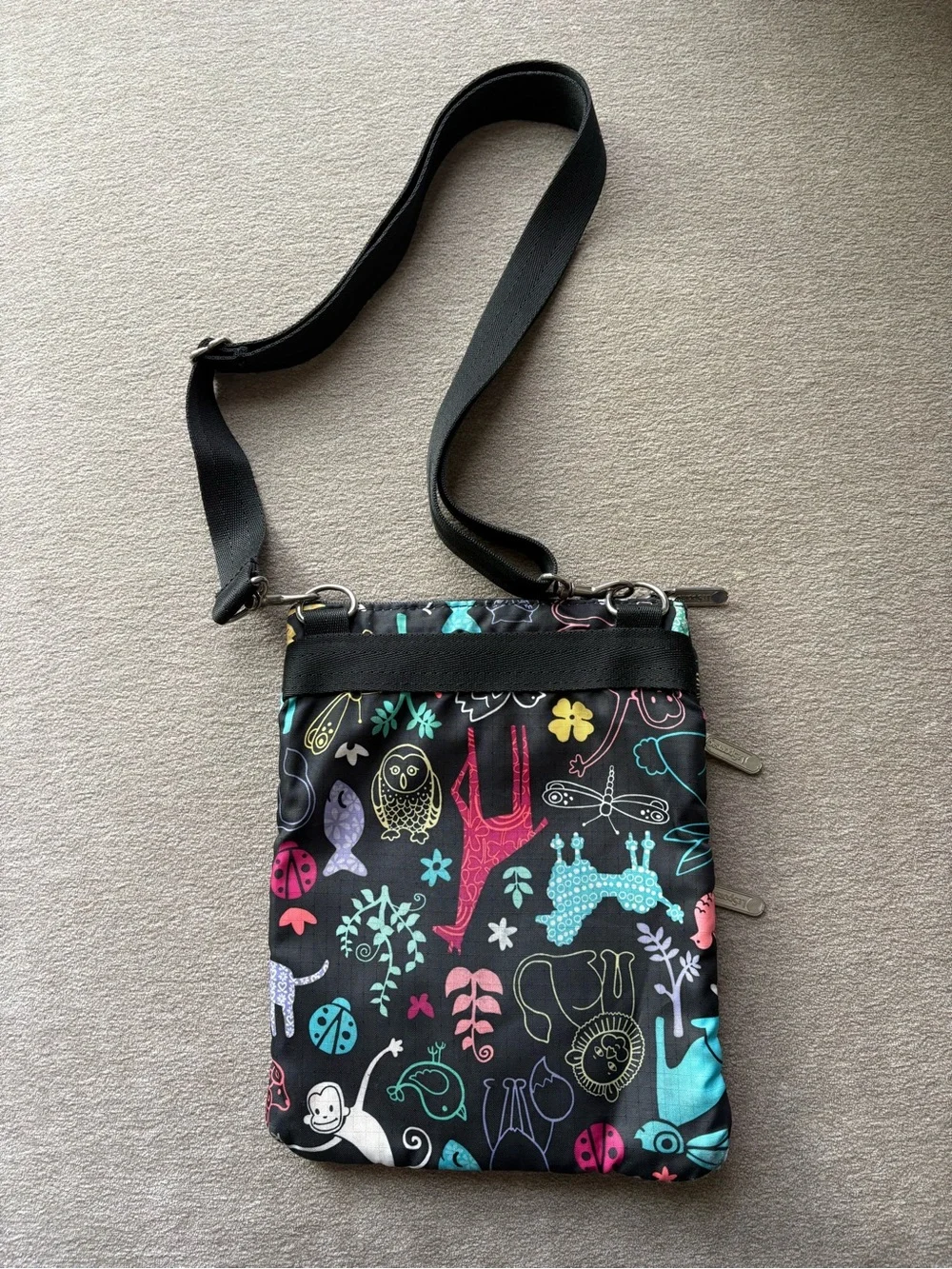 LeSportsac Black Crossbody with Colorful Animal & Floral Print